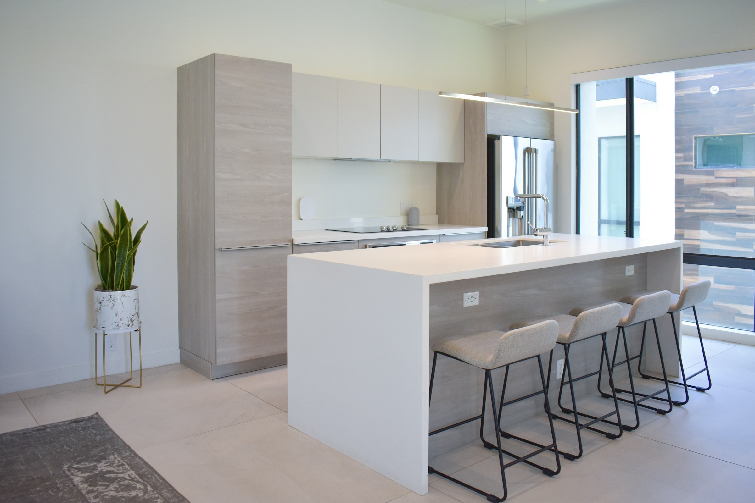 Contemporary kitchen with a large island and bar seating